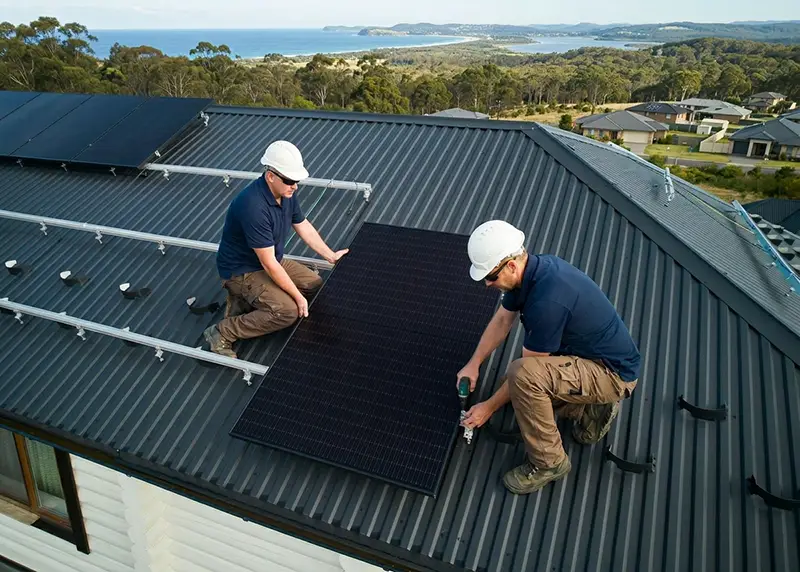 Installing-solar-panels-on-a-roof Installing solar panels on a roof